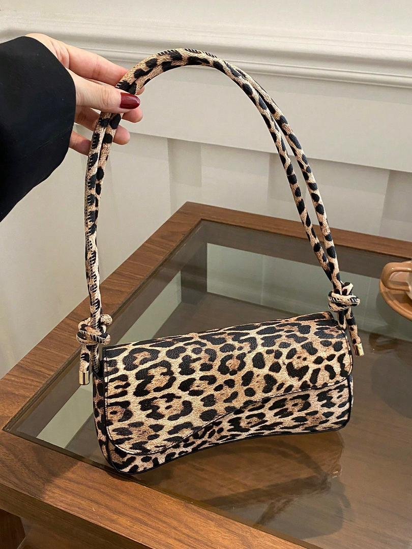 Cartera animal print tira ajustable